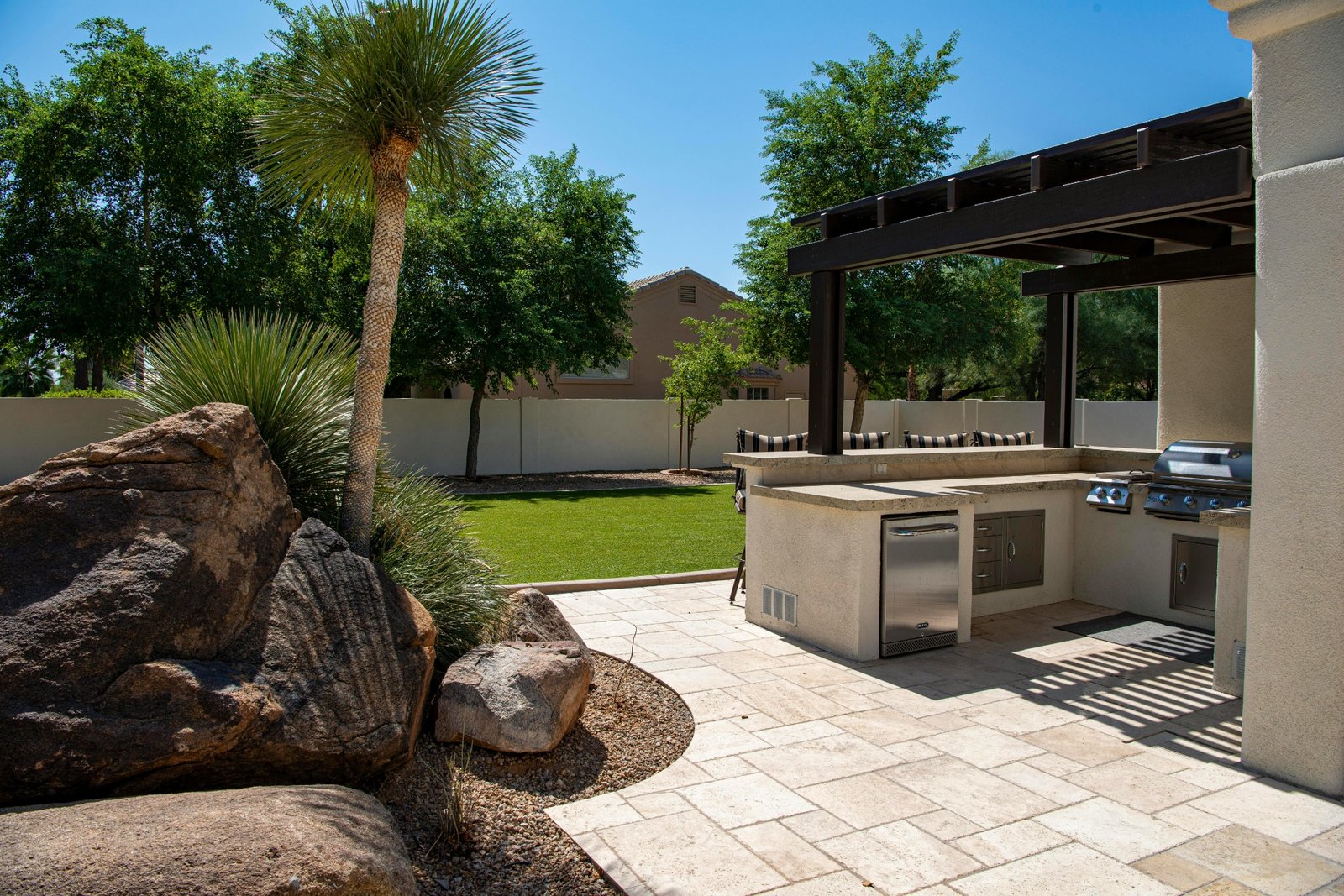 Outdoor kitchen with paver patio